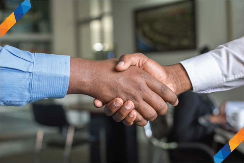 Shaking hands to close a deal - Photo by Cytonn Photography on Unsplash